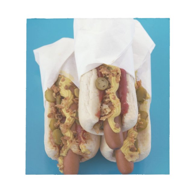 Three hot dogs in buns notepad (Front)