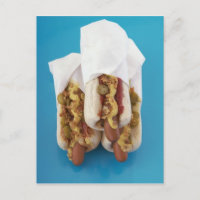 Three hot dogs in buns