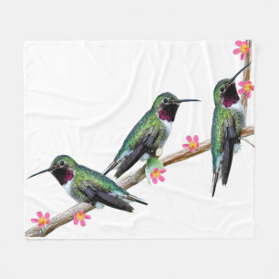 Three Hummingbirds perched on a branch of a Floss Fleece Blanket