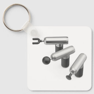 Three massage guns with different massage heads key ring