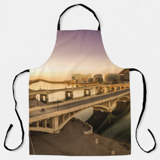 THREE MEN ON MOTORCYCLES CROSSING BRIDGE APRON