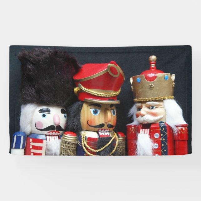 Three nutcrackers on dark background banner (Horizontal)