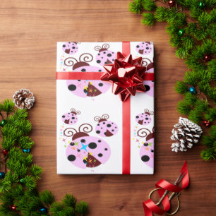 Three pink and black ladybug with stars wrapping paper