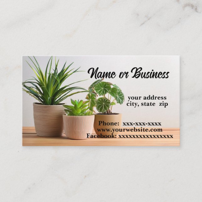 Three plants on a wood table business card (Front)