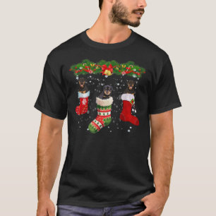 Three Rottweiler Dog In Sock Christmas Santa Hat X T-Shirt