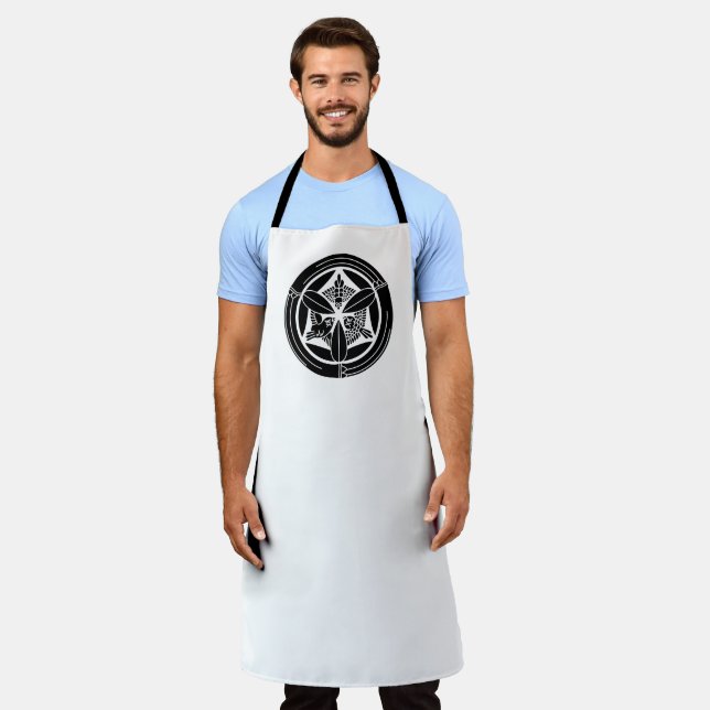 Three Spoons in a Bamboo Circle Apron (Worn)