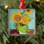 Three Sunflowers | Vincent van Gogh Metal Tree Decoration<br><div class="desc">Three Sunflowers (1888) by Vincent van Gogh is a vibrant still life that showcases the artist’s signature thick brushstrokes and bold use of colour. The painting features three sunflowers in a simple vase, their golden petals contrasting against the aqua blue background. Van Gogh's vivid yellow palette brings energy and life...</div>