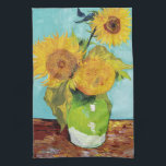 Three Sunflowers | Vincent van Gogh Tea Towel<br><div class="desc">Three Sunflowers (1888) by Vincent van Gogh is a vibrant still life that showcases the artist’s signature thick brushstrokes and bold use of colour. The painting features three sunflowers in a simple vase, their golden petals contrasting against the aqua blue background. Van Gogh's vivid yellow palette brings energy and life...</div>