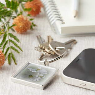 three white flowers key ring