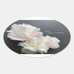 Three white peonies on dark grey oval sticker