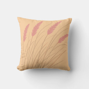 Throw pillow in peach and pink with beach grass
