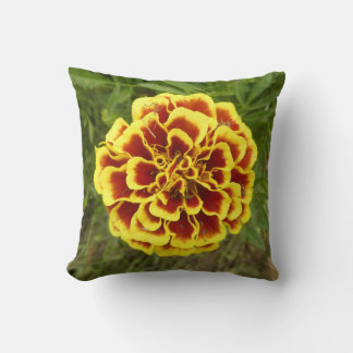 Throw Pillow With Picture Of Marigold On It