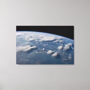 Thunderhead Anvils Of Earth Onto Southern Borneo. Canvas Print