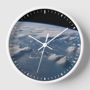 Thunderhead Anvils Of Earth Onto Southern Borneo. Clock