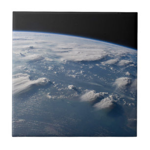 Thunderhead Anvils Of Earth Onto Southern Borneo. Tile