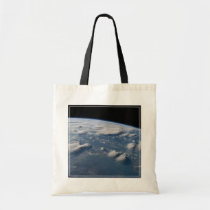 Thunderhead Anvils Of Earth Onto Southern Borneo. Tote Bag