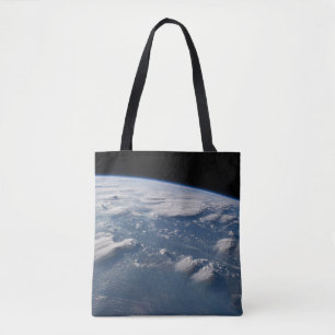 Thunderhead Anvils Of Earth Onto Southern Borneo. Tote Bag