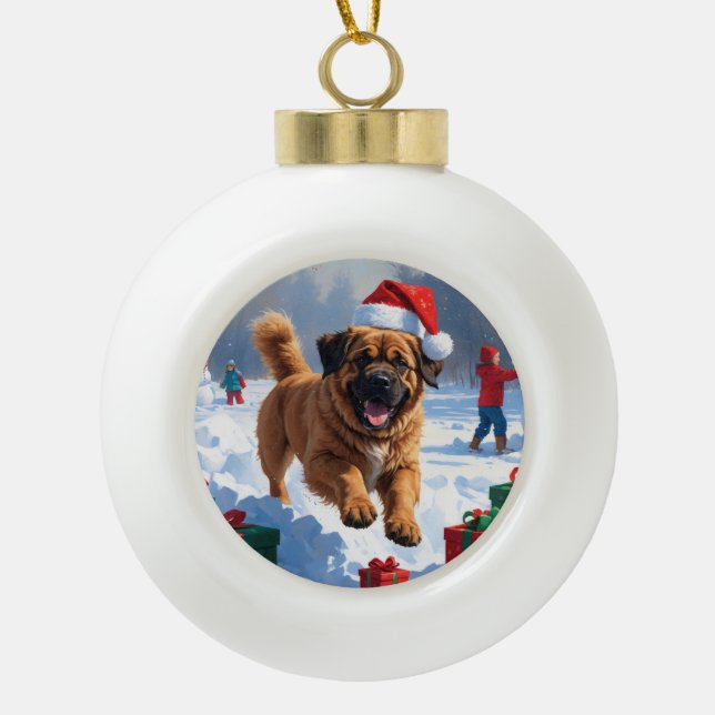 Tibetan Mastiff Running in Snow with Christmas Hat Ceramic Ball Christmas Ornament (Front)