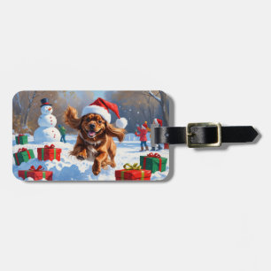 Tibetan Spaniel Running in Snow with Christmas Hat Luggage Tag