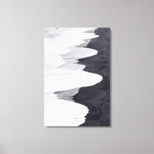 Tide Washes Over Black Beach Canvas Print