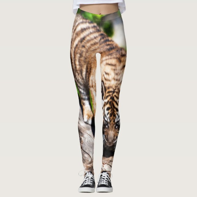 Tiger cub climbing down tree leggings (Front)