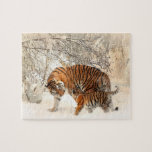 Tiger with cub in the Snow Jigsaw Puzzle<br><div class="desc">Tiger cub playing with its mother in the snow.</div>