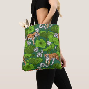 Tigers in the white lotus pond tote bag