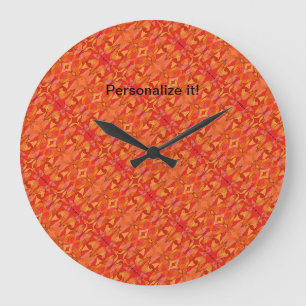 Tiled and mirrored organic shapes in hot colours large clock