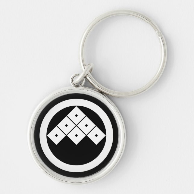 Tilted six-squrae-eyes in circle key ring (Front)