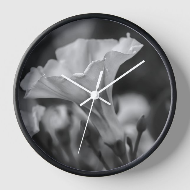Timeless Elegance: Black and White Floral Clock (Front)