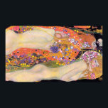 Timeless Elegance: Gustav Klimt's Water Serpents 2 Poster<br><div class="desc">Immerse yourself in the captivating allure of Gustav Klimt's masterpiece, "Water Serpents II, " now meticulously reproduced on a poster of unparalleled quality. Adorn your surroundings with the sublime beauty of this famous painting, featuring high-quality detail and resolution that captures every nuance of Klimt's artistry. The smooth, sharp focus and...</div>