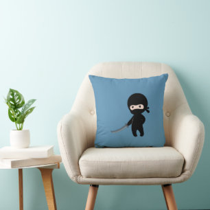 Tiny Angry Ninja on Blue Cushion