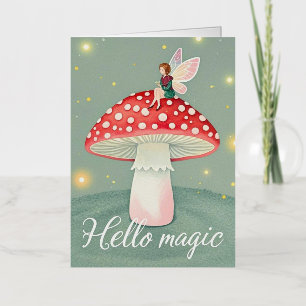 Tiny fairy perched on top of mushroom and glowing  foil greeting card