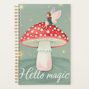 Tiny fairy perched on top of mushroom and glowing planner