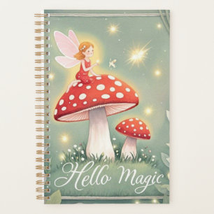 Tiny fairy perched on top of mushroom and glowing planner