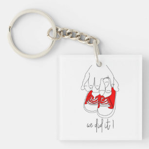 Tiny hands and tiny feet ready to pop key ring