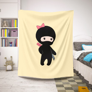 Tiny Ninja Girl on Yellow Sherpa Blanket