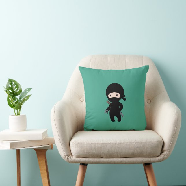 Tiny Ninja Holding Throwing Star On Dark Green Cushion (Chair)
