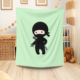 Tiny Ninja Holding Throwing Star On Green Fleece Blanket