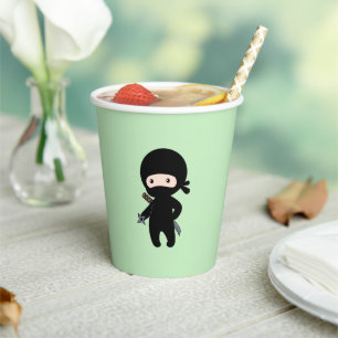 Tiny Ninja Holding Throwing Star on Green Paper Cups