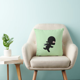 Tiny Ninja Running On Green Cushion