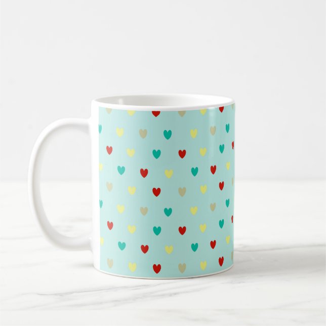 Tiny polka hearts on seafoam green coffee mug (Left)