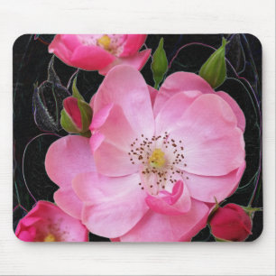 tiny rosebud opens mouse pad