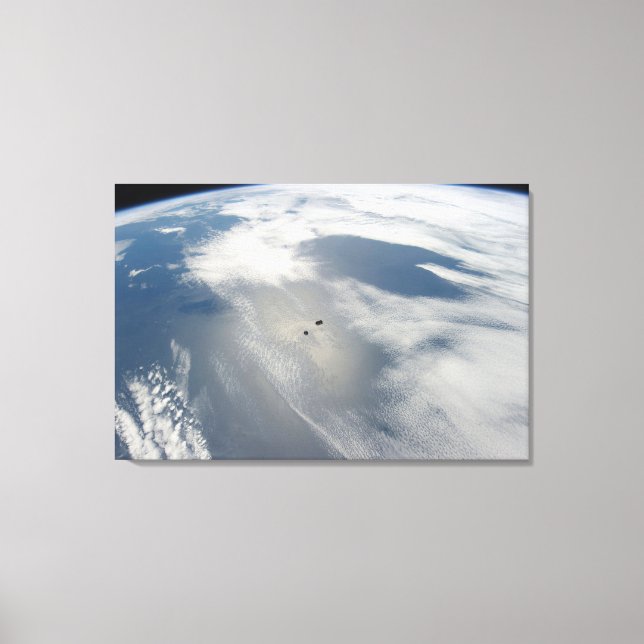 Tiny Satellites Orbit Above A Part Of Earth. Canvas Print (Front)