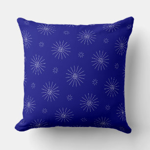 Tiny white flowers on navy blue cushion