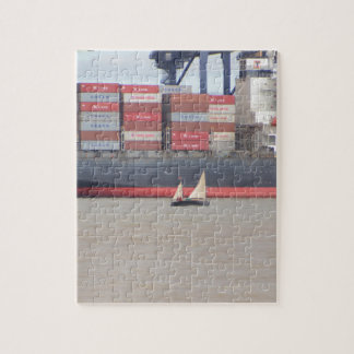 Tiny Yacht  And Huge Container Ship Jigsaw Puzzle