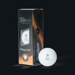 Titleist Pro V1 Golf Balls<br><div class="desc">Titleist Pro V1 golf balls shown with a winner's wreath and clubs print,  shown with a sample custom name,  customise and change the text to yours.
Three Pack    Text colour Black
Customise this item and change the sample name to yours.</div>