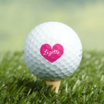 Titleist Pro V1 women's golf balls with pink heart<br><div class="desc">Titleist Pro V1 women's golf balls with pink heart. Personalised golf gifts for her. Add your own name or initial letters. Fun Birthday gift idea for golfers and golfing fans. Neon pink or custom colour design. Also available on other good brands like Wilson, Callaway, Bridgestone, Srixon etc. Create them for...</div>