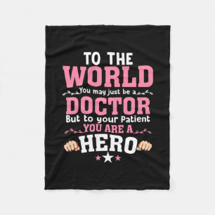 To The World You May Just Be A Doctor Fleece Blanket