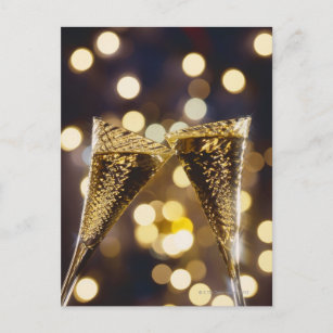 Toasted champagne flute, close-up postcard